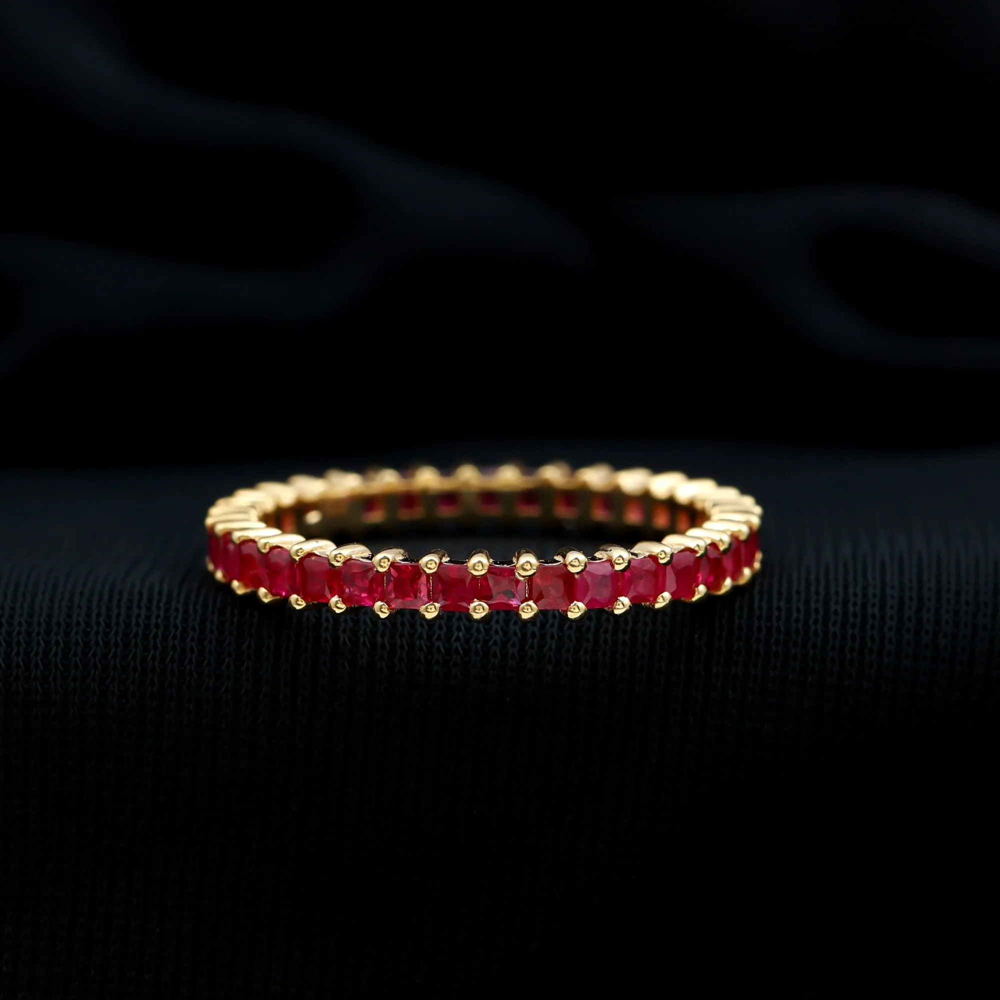 Princess Cut Ruby Eternity Ring in Shared Prong Setting