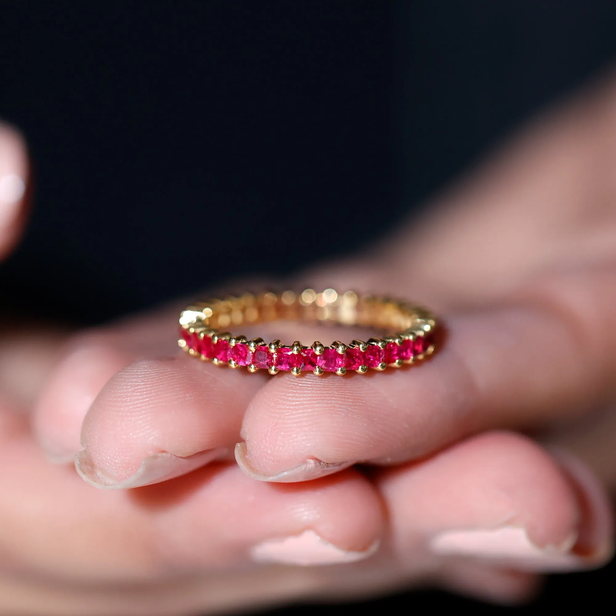 Princess Cut Ruby Eternity Ring in Shared Prong Setting