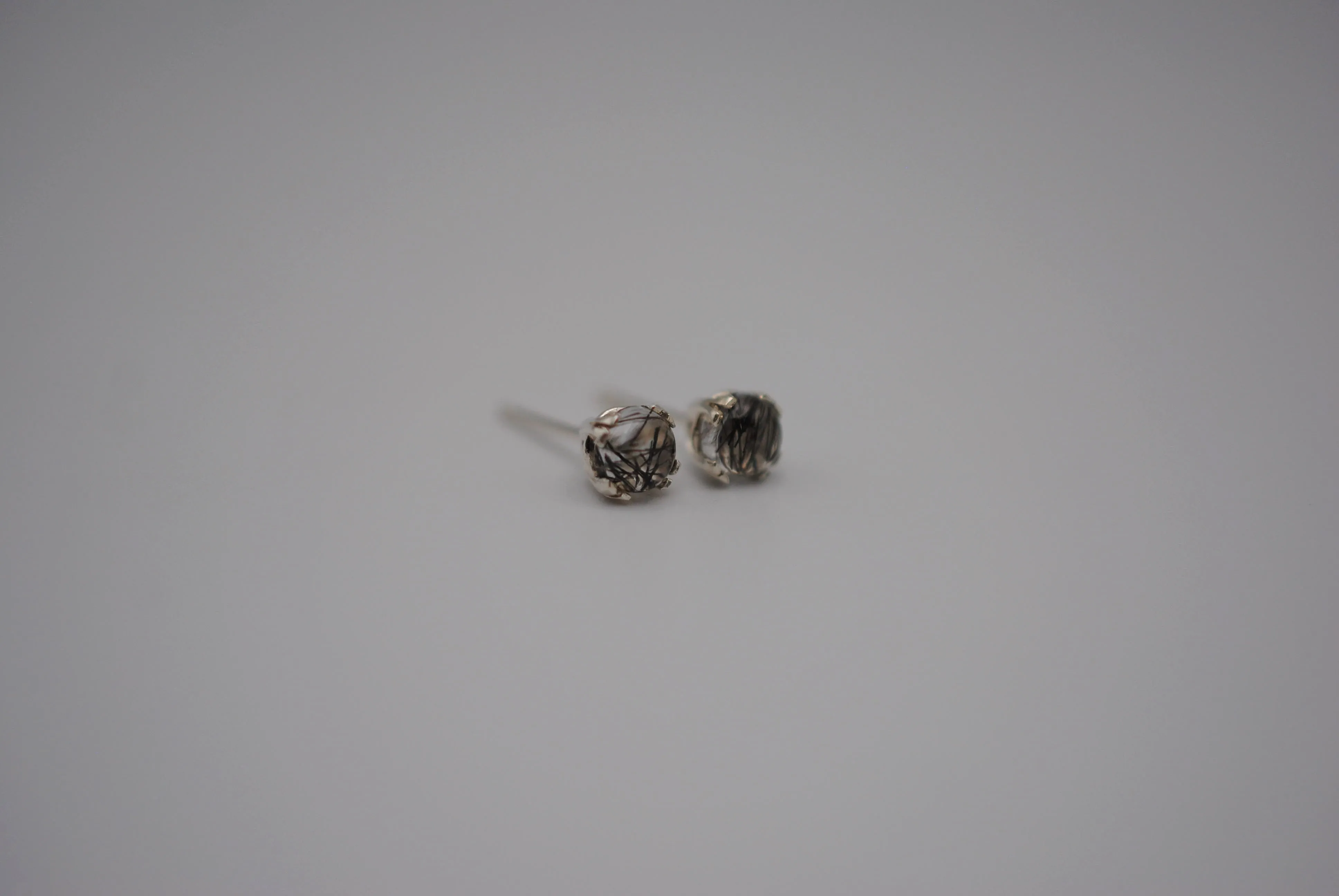 Rutilated Quartz Post Earrings: Round Cut, Silver, Double Prong Setting