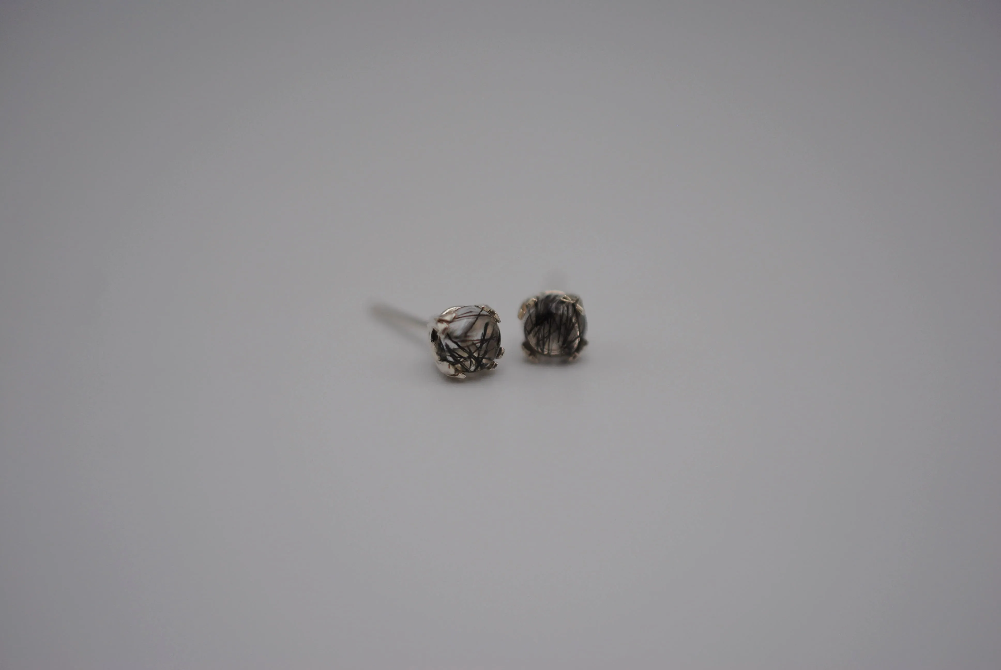 Rutilated Quartz Post Earrings: Round Cut, Silver, Double Prong Setting
